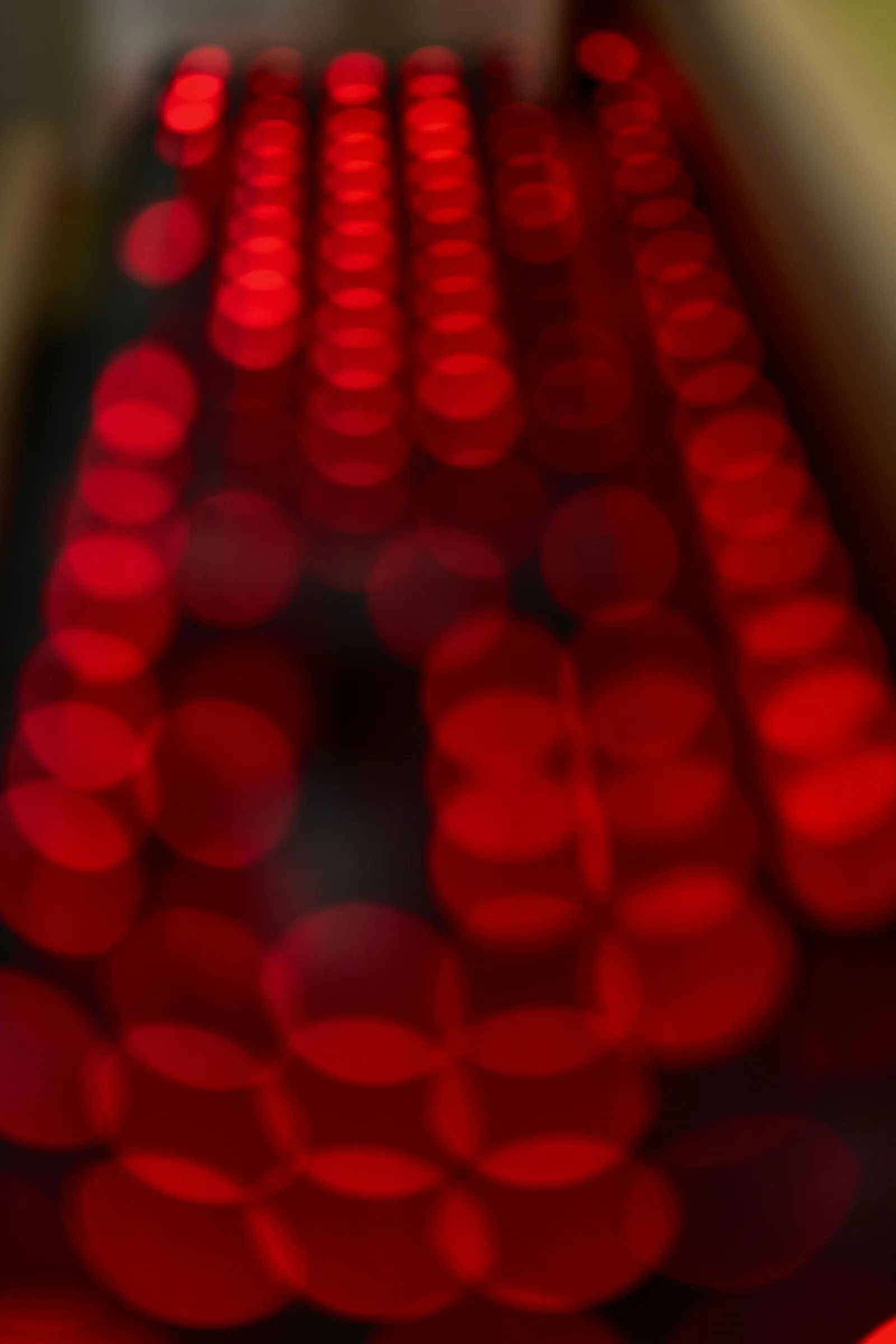 Rows of red LEDs glowing softly out of focus
